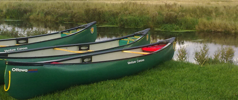 Open boats on the banks of teh Ancholme